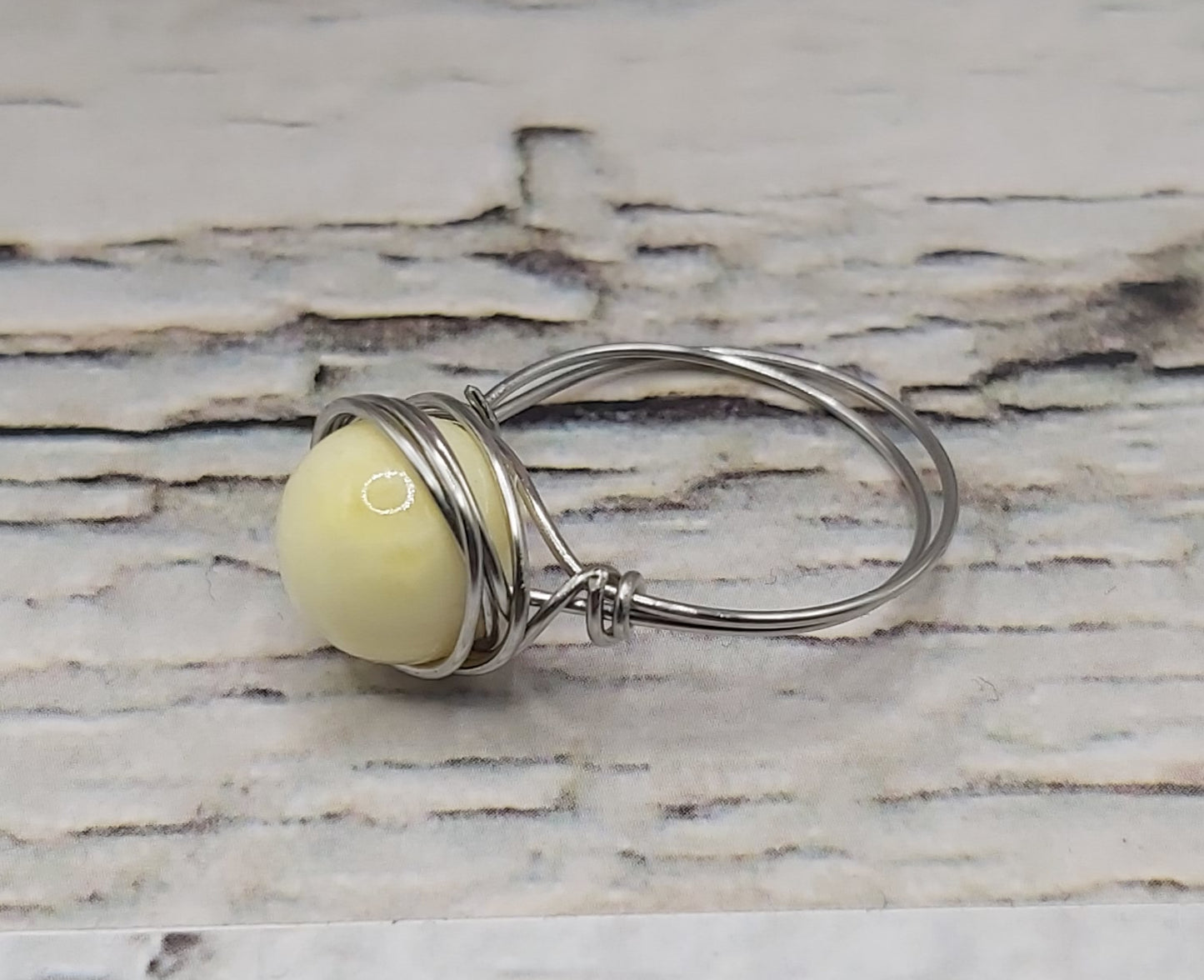 Pale Yellow Wire Wrapped Ring- Stainless Steel Wire. Size 7.5